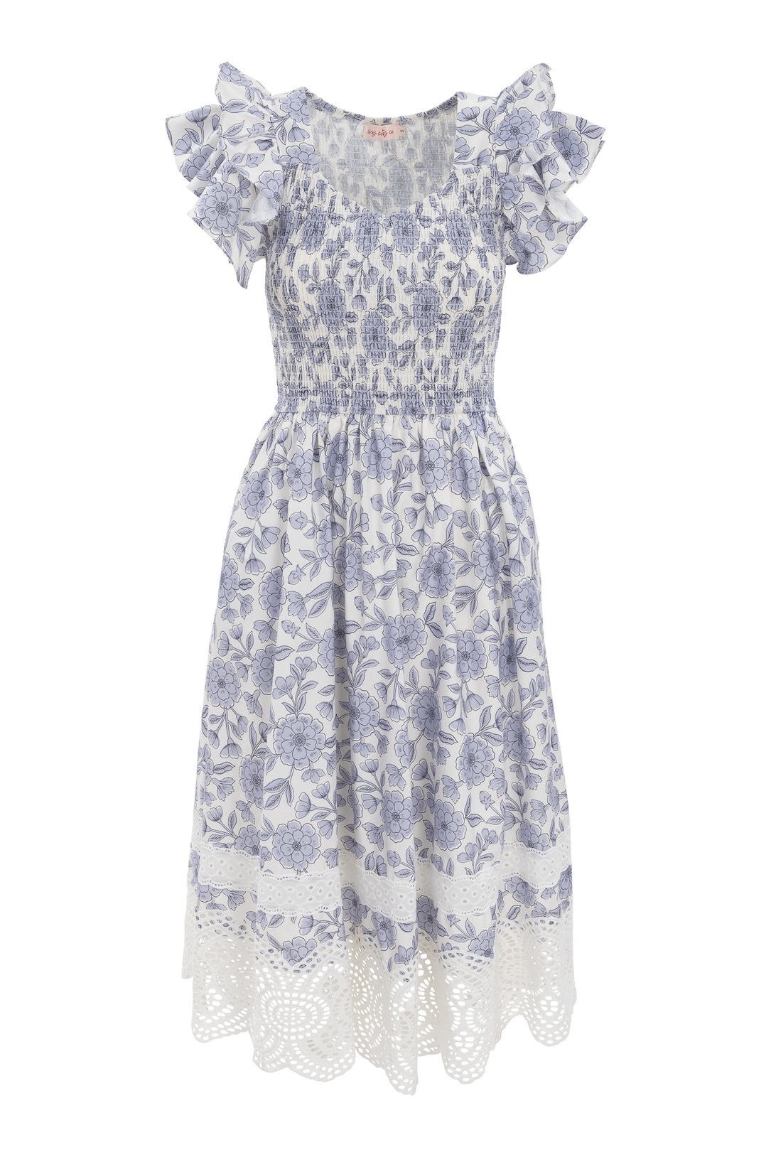 The Hattie Dress in Blue Floral by Ivy City Co is a white cotton midi dress with short ruffled sleeves, a shirred bodice, blue floral print, and an intricately laced hem—perfect for any occasion.