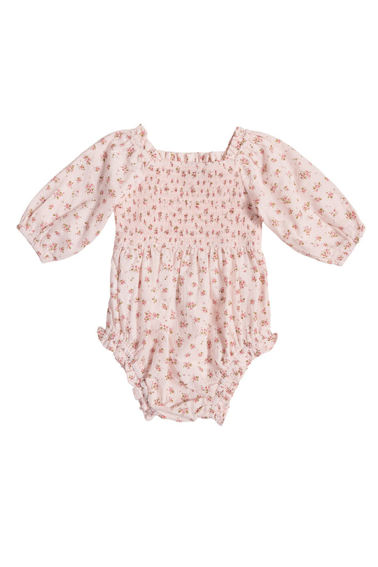 The Baby Madeline Romper in Pink by Ivy City Co features long puff sleeves, a square neckline, delicate floral print, smocked bodice, and ruffled leg openings—an adorable choice for Easter or any special occasion.