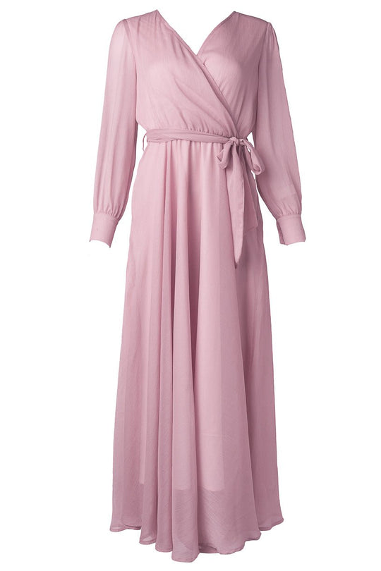 The Andie Dress in Blush by Ivy City Co is a long-sleeved, floor-length maxi dress featuring a V-neckline and tie waist, shown against a white background. Ideal as a maternity nursing dress, it combines elegant style and comfort, making it perfect for special occasions.