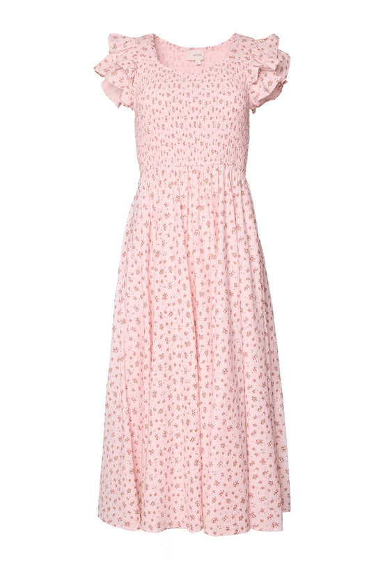 The Hattie Dress in Madeline Pink by Ivy City Co is a light pink midi cotton dress with short sleeves, ruffled shoulder detail, floral print, a fitted smocked bodice, and flowy gathered skirt—ideal as a birthday girl dress.