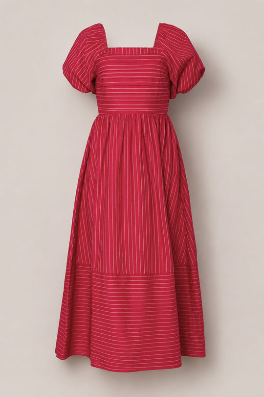 A Julie Dress in Cranberry Pinstripe by Ivy City Co, featuring short puff sleeves, a square neckline, a fitted bodice with vertical white pinstripes, and a skirt accented by a horizontal striped panel near the hem for added interest.