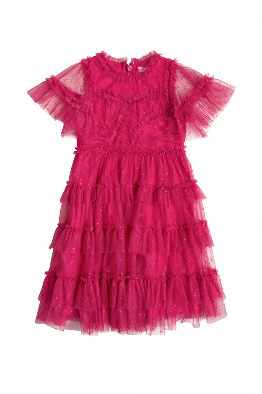 The Mini Whimsical Dress in Fuchsia by Ivy City Co features flutter sleeves, tiered ruffles, and a sheer tulle overlay adorned with intricate stitching. Its fitted bodice and layered tulle skirt create a flared silhouette, highlighted by delicate star-like embellishments throughout. Displayed on a white background.