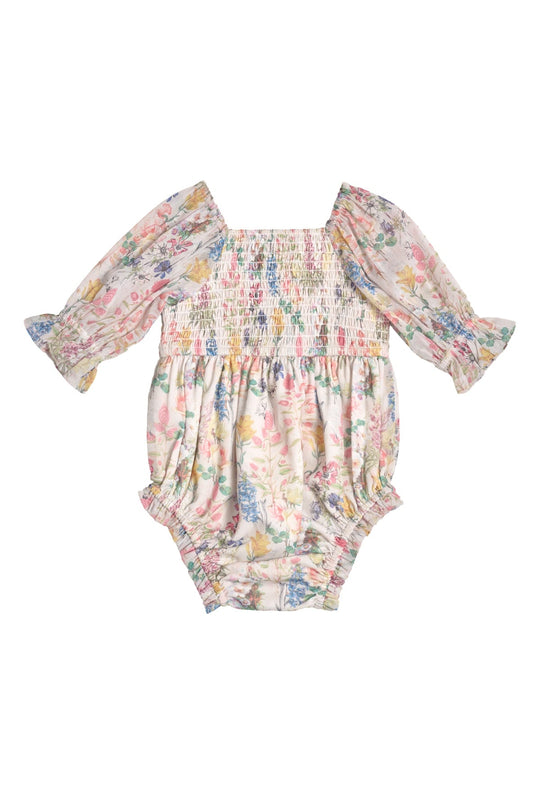 The Ivy City Co Baby Madeline Romper in Cordelia Floral showcases long sleeves, a smocked chest, elastic cuffs, and ruffled shoulders, all set against a white background.